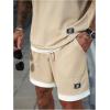 image:imageGORGLITTER Mens Sets 2 Piece Outfits Casual Drop Shoulder Short Sleeve T Shirt and Elastic Waist Shorts SetKhaki