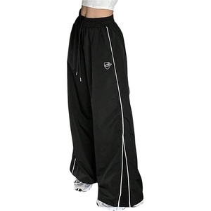 image:imageGORGLITTER Womens Cheetah Leopard Print Pants Wide Leg Low Rise Sweatpants  Animal Print Baggy Striped Trousers Flare Flowy Bottoms Y2K Rave Western Festival OutfitsSolid Black